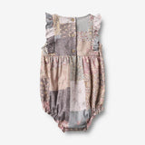 Wheat Main Sommerdragt Emmaline Romper 9618 patchwork flowers