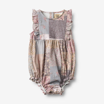 Wheat Main Sommerdragt Emmaline Romper 9618 patchwork flowers