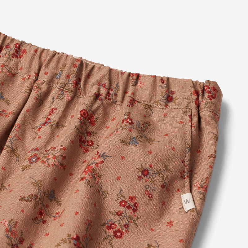Wheat Main  Foret Bukser Malou | Baby Trousers 2122 berry dust flowers