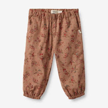 Wheat Main  Foret Bukser Malou | Baby Trousers 2122 berry dust flowers